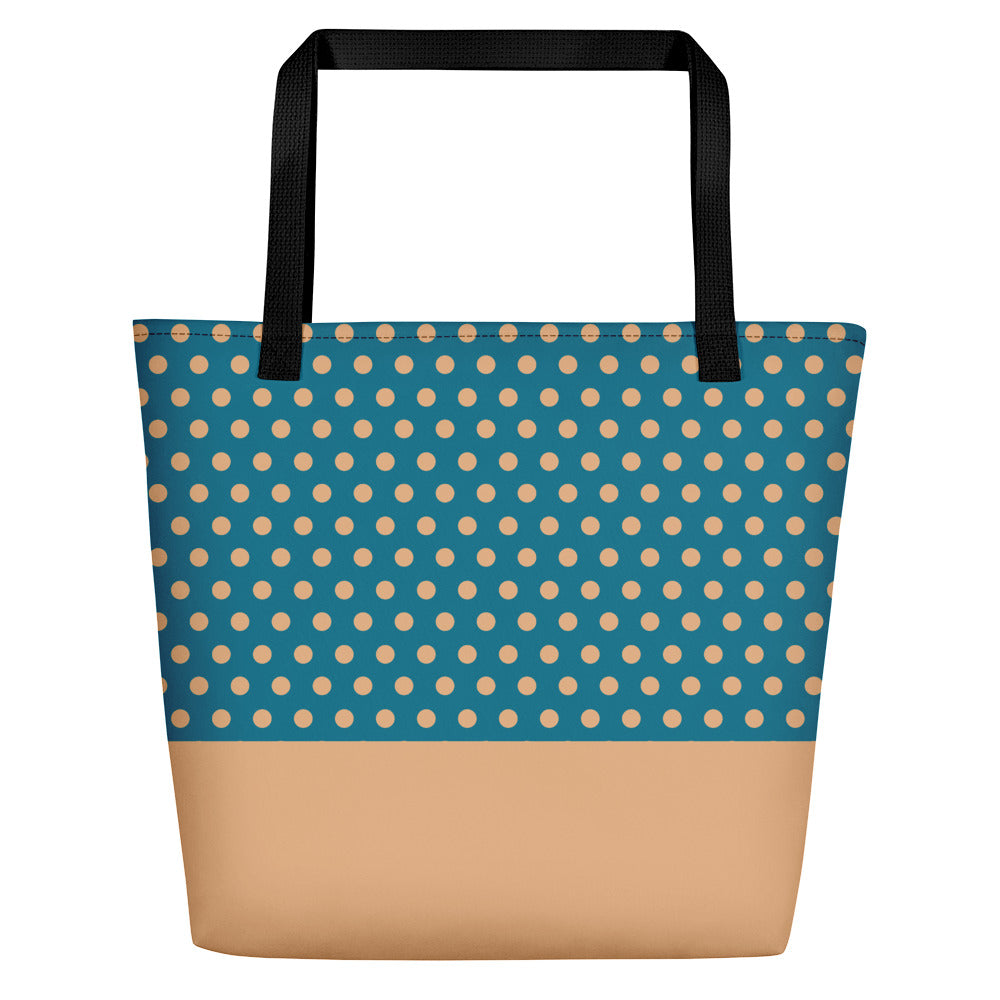 Image of tote bag with black cotton web handles. Tote bag is tan polka dots on a teal background. 