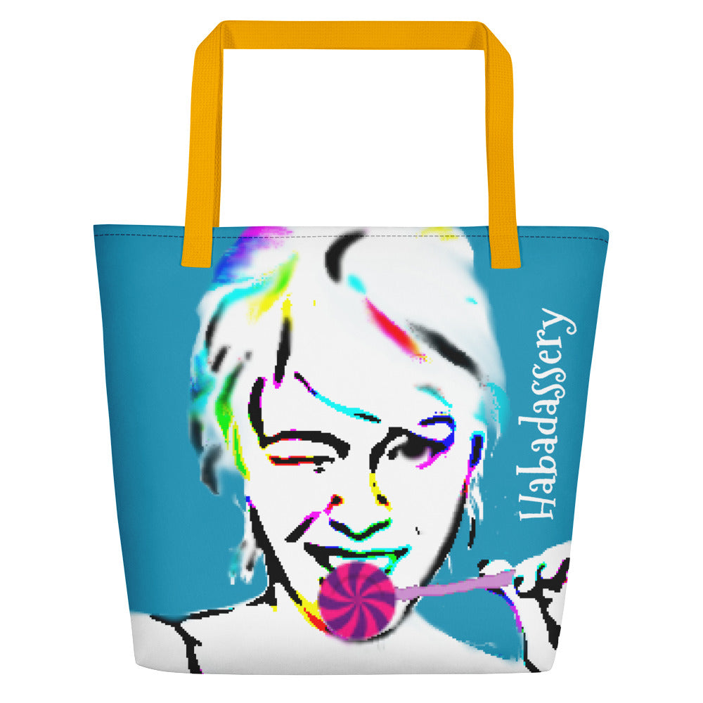 Image of turquoise tote bag by Habadassery with yellow cotton web handles. Tote bag shows art drawing of girl winking with a purple and pink lollipop.
